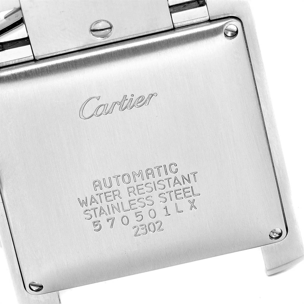 This image shows the back case of a Cartier Tank Française watch, displaying its specifications and engraving.