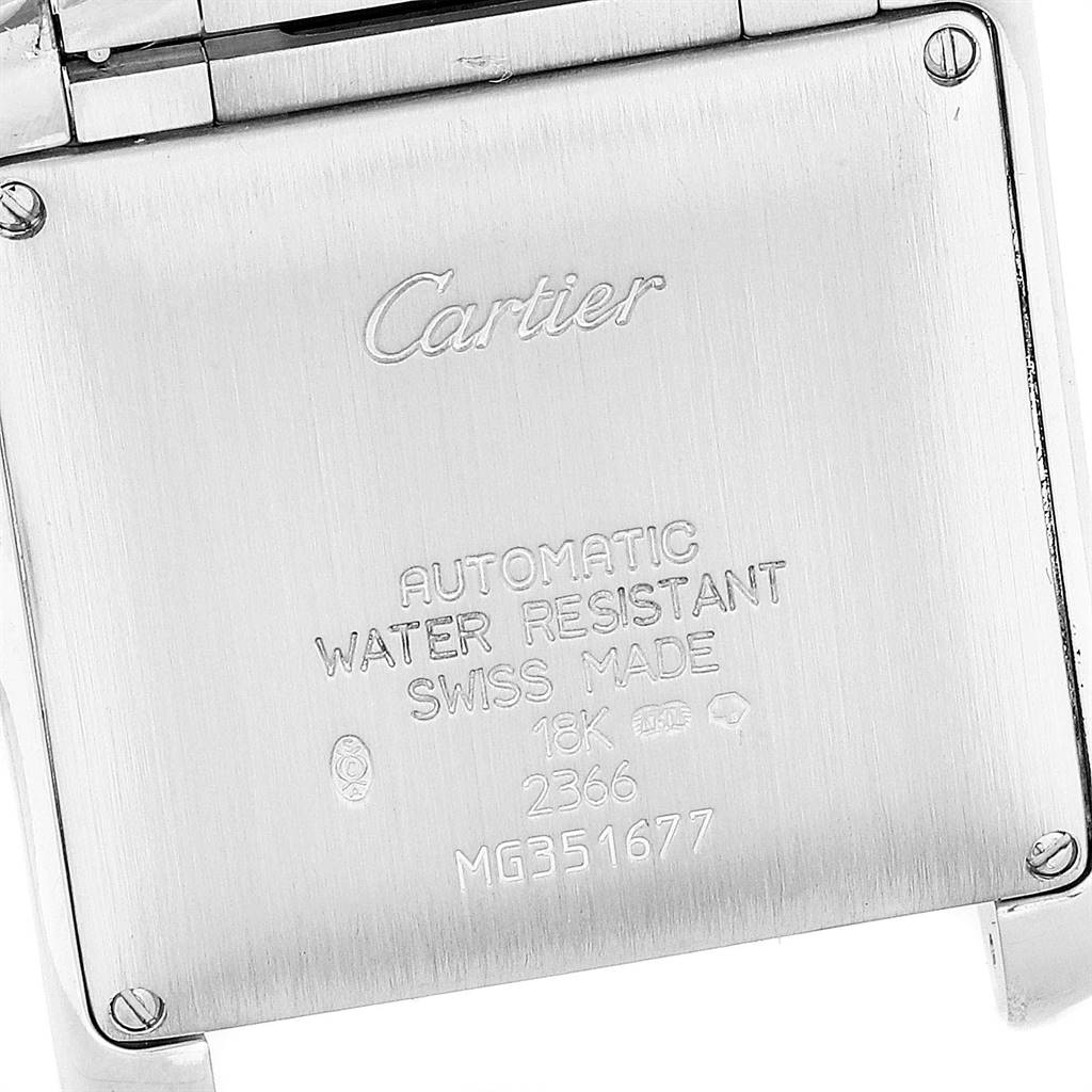 The image shows the back case of a Cartier Tank Francaise W50011S3 Men's White Gold Silver Dial W50011S3 Men's White Gold Silver Dial watch, featuring engravings with specifications and branding.