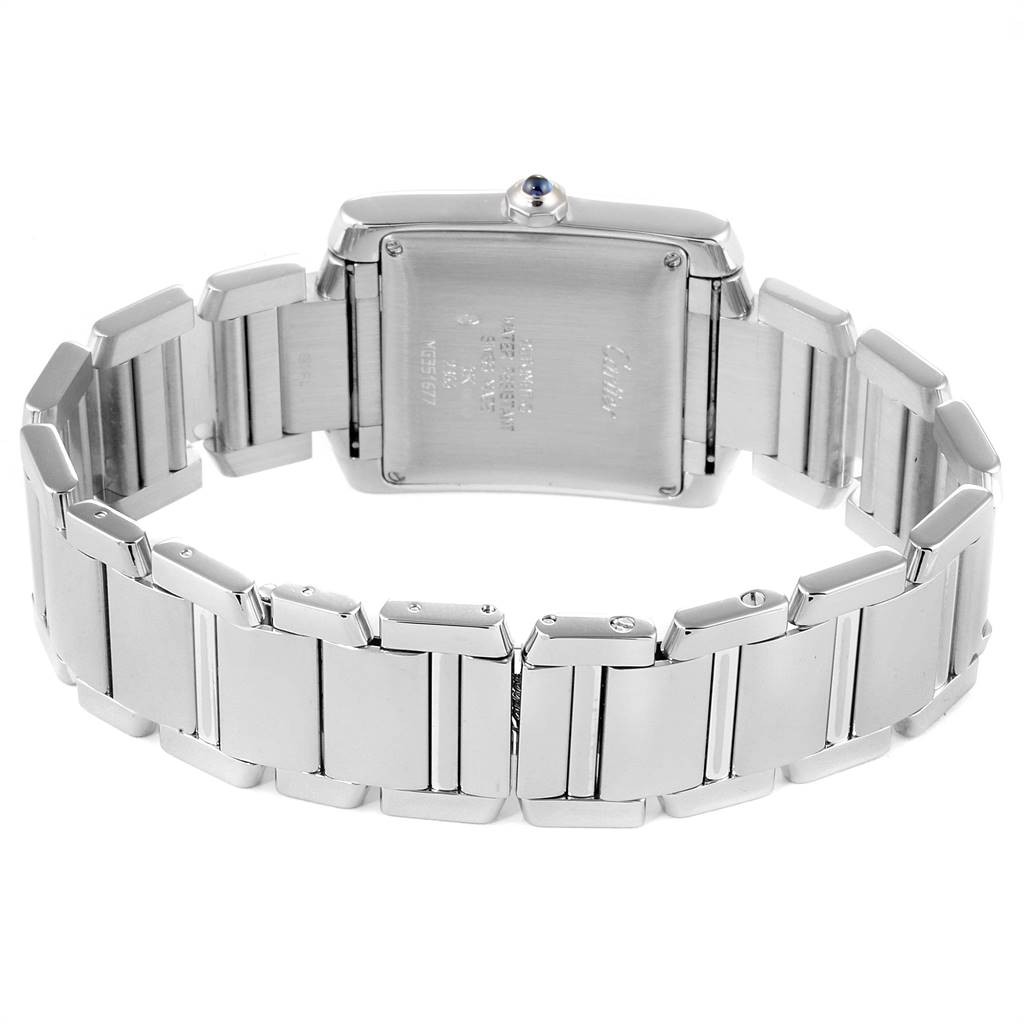 The image shows the back of a Cartier Tank Francaise W50011S3 Men's White Gold Silver Dial W50011S3 Men's White Gold Silver Dial watch with a stainless steel bracelet.