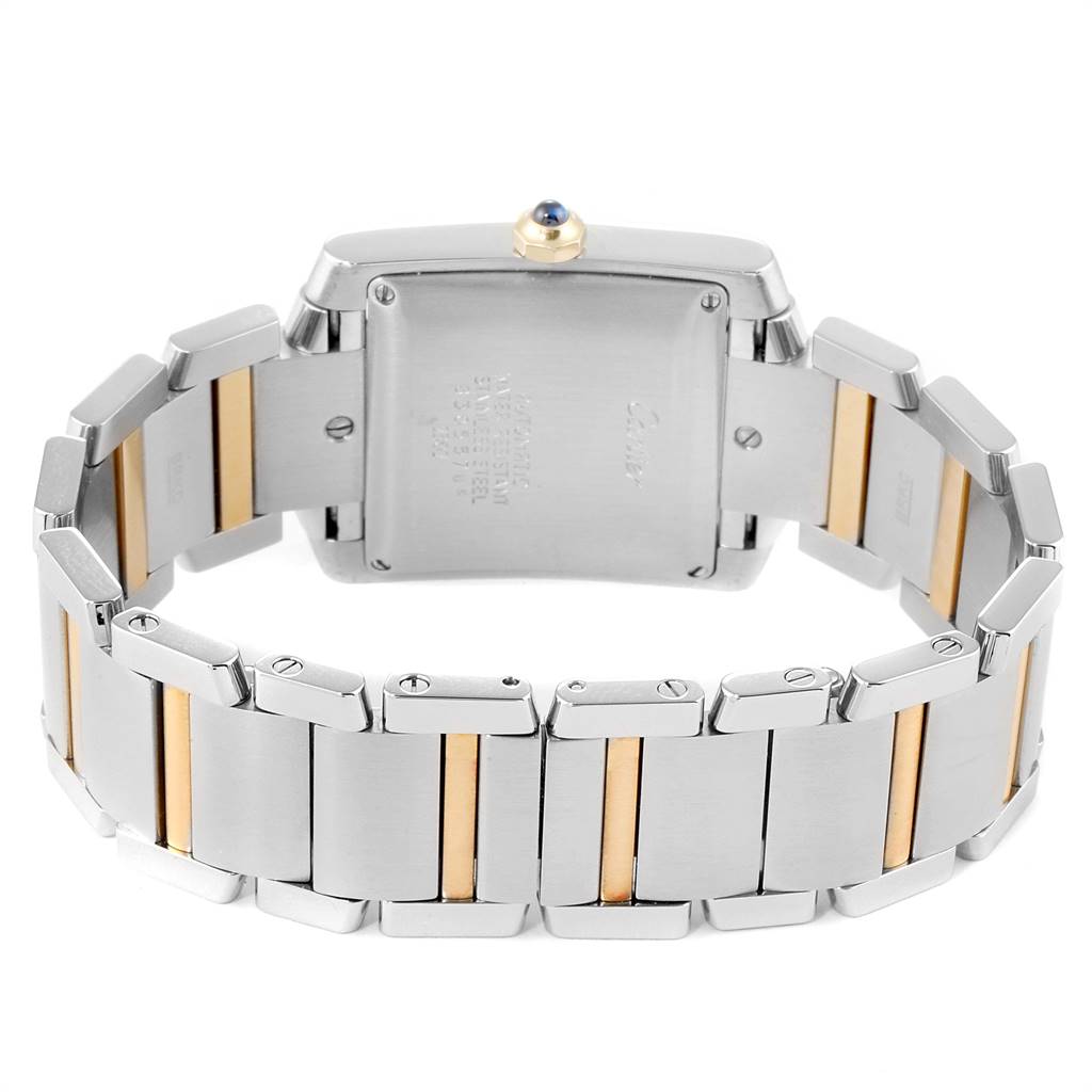 The image shows the back view of a Cartier Tank Francaise W51005Q4 Men's Steel and Gold (two tone) Silver Dial W51005Q4 Men's Steel and Gold (two tone) Silver Dial watch, highlighting its two-tone metal bracelet and case back.