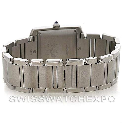 This image shows the back side of a Cartier Tank Française watch, focusing on its stainless steel bracelet and case back.