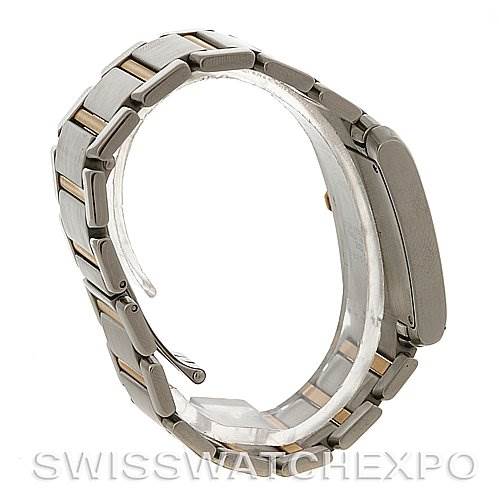 The image shows a side view of the Cartier Tank Francaise W51004Q4 Men's Steel and Gold (two tone) Silver Dial W51004Q4 Men's Steel and Gold (two tone) Silver Dial watch, highlighting the bracelet and the case's side profile.