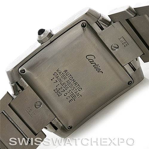 The image shows the back case and part of the bracelet of a Cartier Tank Française watch.