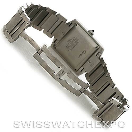 The image shows the back and clasp of a Cartier Tank Francaise W51002Q3 Men's Stainless Steel Silver Dial W51002Q3 Men's Stainless Steel Silver Dial watch, highlighting its stainless steel bracelet and deployant clasp.