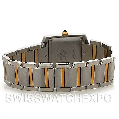 The image shows the back and bracelet of the Cartier Tank Française watch, highlighting its stainless steel and gold two-tone design.