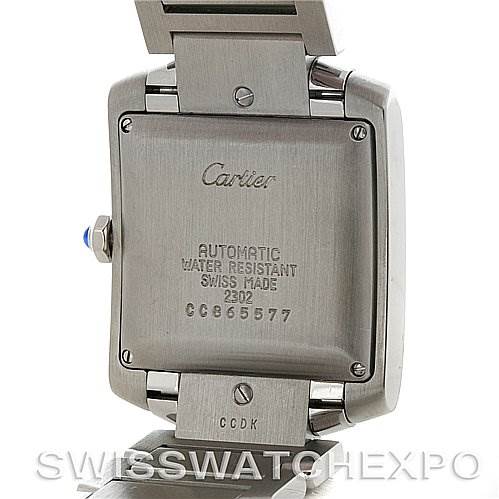 The image shows the back case of a Cartier Tank Francaise W51002Q3 Men's Stainless Steel Silver Dial W51002Q3 Men's Stainless Steel Silver Dial watch, highlighting the screws and engravings.