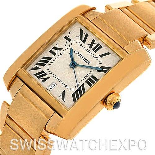 The image shows a close-up, slightly angled view of the Cartier Tank Francaise W50001R2 Men's Yellow Gold Silver Dial W50001R2 Men's Yellow Gold Silver Dial watch, highlighting its face, bezel, crown, and part of the bracelet.