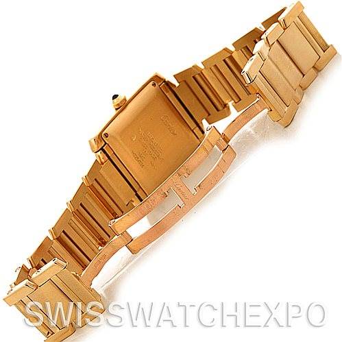 The image shows the back and bracelet of a Cartier Tank Francaise W50001R2 Men's Yellow Gold Silver Dial W50001R2 Men's Yellow Gold Silver Dial watch at an angled overhead view.