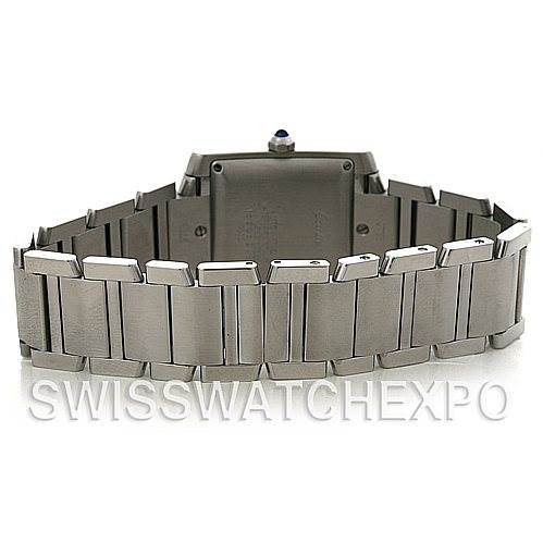 The image shows the back view of a Cartier Tank Francaise W51002Q3 Men
s Stainless Steel Silver Dial W51002Q3 Men
s Stainless Steel Silver Dial watch, highlighting the bracelet, case back, and crown with a blue cabochon.