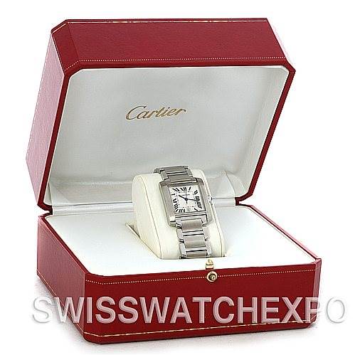 The Cartier Tank Française watch is shown at an angle inside its open red case.