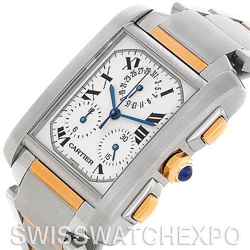 The image shows a detailed view of a Cartier Tank Francaise W51004Q4 Men's Steel and Gold (two tone) Silver Dial W51004Q4 Men's Steel and Gold (two tone) Silver Dial with a two-tone bracelet, blue hands, and subdials.