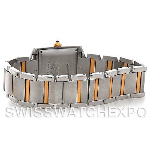 This image shows the back angle of a Cartier Tank Française watch, highlighting its two-tone metal bracelet.