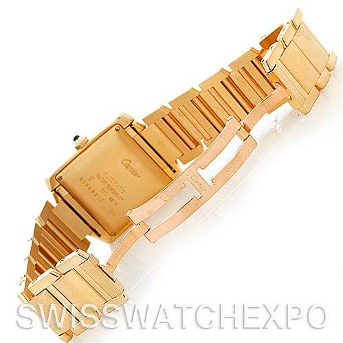 The image shows the back view of a Cartier Tank Francaise W50001R2 Men's Yellow Gold Silver Dial W50001R2 Men's Yellow Gold Silver Dial watch, focusing on the gold bracelet and clasp.