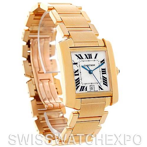 This image features a Cartier Tank Francaise W50001R2 Men's Yellow Gold Silver Dial W50001R2 Men's Yellow Gold Silver Dial watch from an angled view showing the face, crown, bezel, bracelet, and clasp.