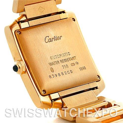 This image shows the back and part of the bracelet of a Cartier Tank Francaise W50001R2 Men's Yellow Gold Silver Dial W50001R2 Men's Yellow Gold Silver Dial watch at an angle.