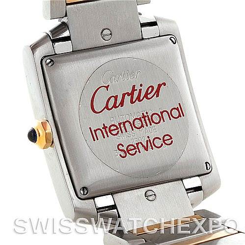 The image shows the back case of a Cartier Tank Francaise W51005Q4 Men's Steel and Gold (two tone) Silver Dial W51005Q4 Men's Steel and Gold (two tone) Silver Dial watch, emphasizing the brand's "Cartier International Service" engraving.