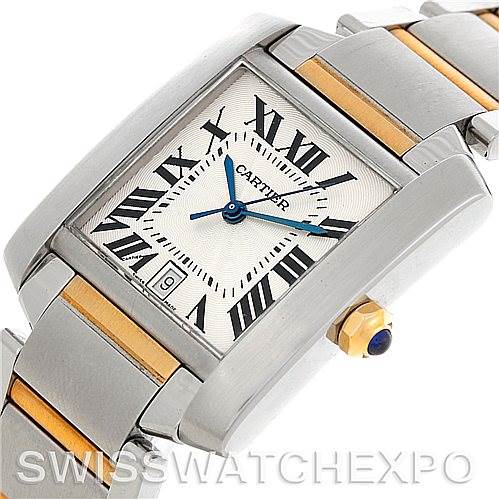 The image shows a close-up of the Cartier Tank Française watch, focusing on the watch face, crown, and part of the bracelet.