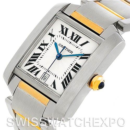 The image shows a Cartier Tank Francaise W51005Q4 Men's Steel and Gold (two tone) Silver Dial W51005Q4 Men's Steel and Gold (two tone) Silver Dial watch from an angled view, highlighting the face, bracelet, crown, and case.