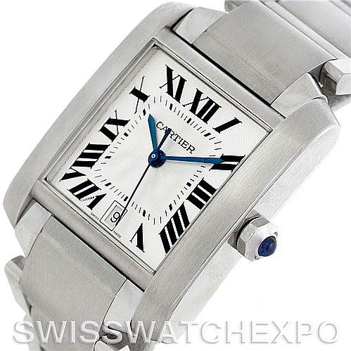 The image shows a close-up of the Cartier Tank Francaise W51002Q3 Men
s Stainless Steel Silver Dial W51002Q3 Men
s Stainless Steel Silver Dial model watch, highlighting the face, crown, and part of the bracelet at an angled view.