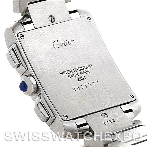 The image shows the back case and part of the bracelet of a Cartier Tank Française watch, displaying the brand name and other inscriptions.