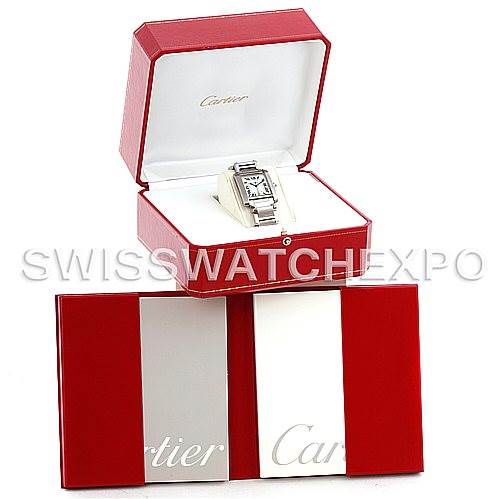 This image shows the Cartier Tank Française watch in its open presentation box, with additional packaging visible below.