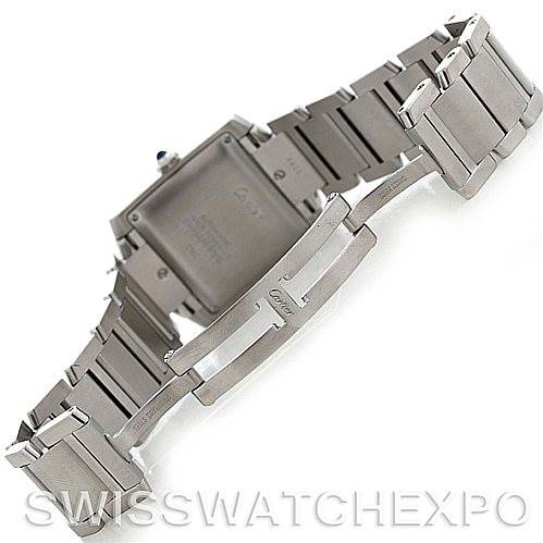 This image shows the Cartier Tank Française watch from the back, highlighting the clasp and metal bracelet.