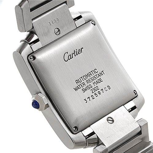The image shows the back and clasp of a Cartier Tank Francaise W51002Q3 Men's Stainless Steel Silver Dial W51002Q3 Men's Stainless Steel Silver Dial watch, highlighting the engravings and stainless steel finish.