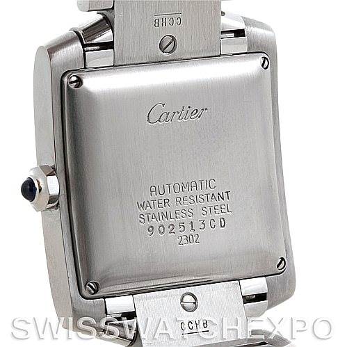 The image shows the back case of a Cartier Tank Francaise W51002Q3 Men's Stainless Steel Silver Dial W51002Q3 Men's Stainless Steel Silver Dial watch, displaying its automatic movement and stainless steel details.
