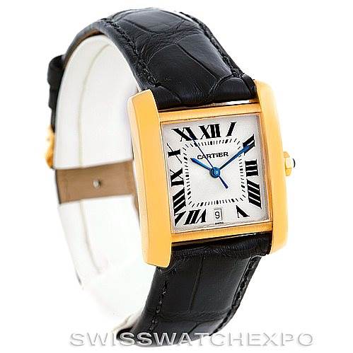 This image shows a Cartier Tank Française watch, featuring a gold case, black leather strap, and roman numeral dial.