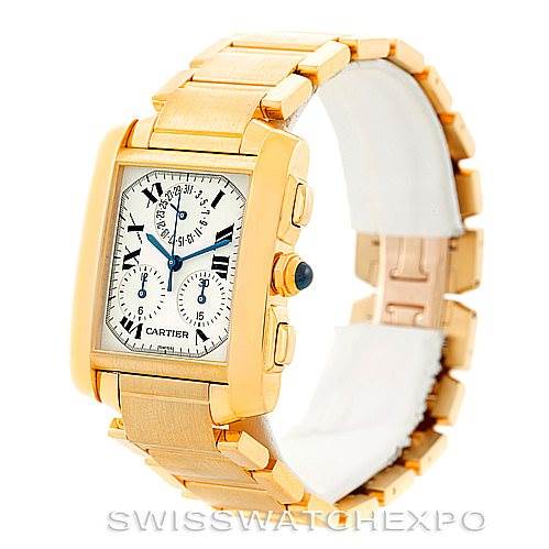 The image shows a Cartier Tank Francaise W50005R2 Men's Yellow Gold Silver Dial W50005R2 Men's Yellow Gold Silver Dial watch from a front-side angle, highlighting its golden rectangular case and linked bracelet.