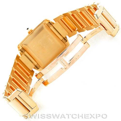 The image shows the Cartier Tank Francaise W50001R2 Men's Yellow Gold Silver Dial W50001R2 Men's Yellow Gold Silver Dial watch from a rear angle, highlighting its gold bracelet and clasp.