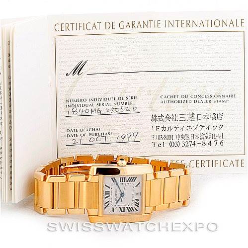 The image shows a Cartier Tank Francaise W50001R2 Men's Yellow Gold Silver Dial W50001R2 Men's Yellow Gold Silver Dial watch in gold, displayed with its international guarantee certificate.