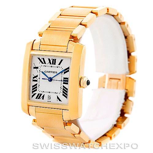 The image shows a side angle of the Cartier Tank Francaise W50001R2 Men's Yellow Gold Silver Dial W50001R2 Men's Yellow Gold Silver Dial watch, highlighting the gold bracelet and square face with Roman numeral markers.
