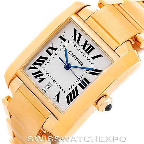 This image shows a Cartier Tank Française watch from an angled, close-up perspective highlighting its face, bracelet, and crown.