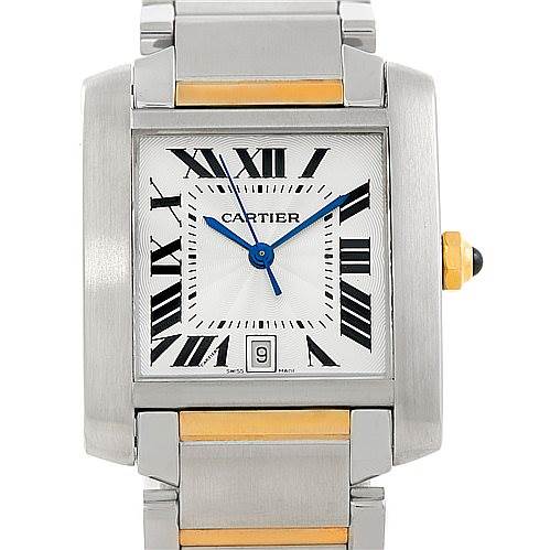 The image shows a Cartier Tank Française watch from a front angle, highlighting its stainless steel case, bracelet, and Roman numeral dial.