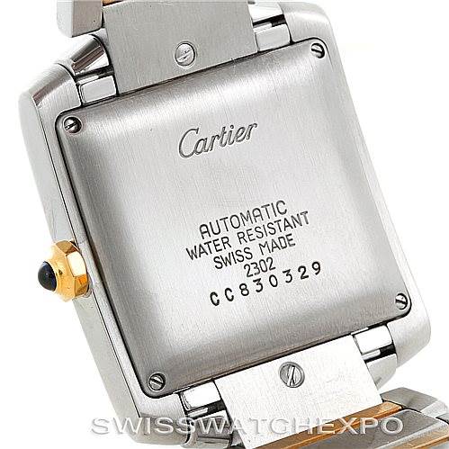 This image shows the case back of a Cartier Tank Française watch, highlighting the brand, model, and specifications.
