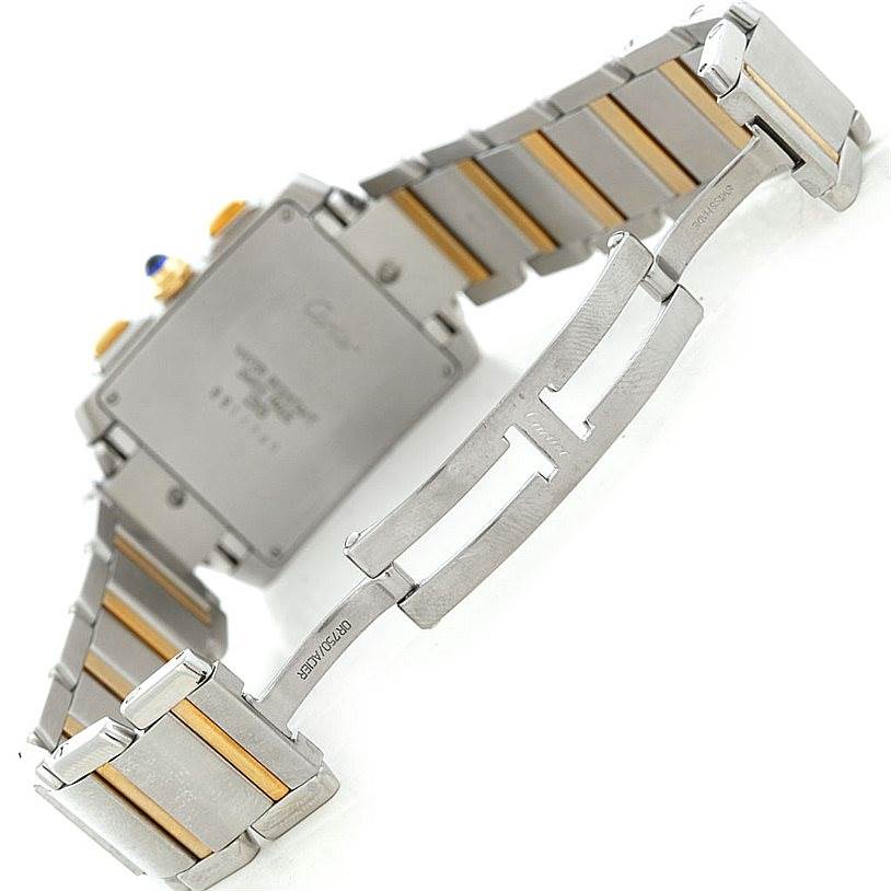 The image shows the back and partially open bracelet of a Cartier Tank Francaise W51004Q4 Men's Steel and Gold (two tone) Silver Dial W51004Q4 Men's Steel and Gold (two tone) Silver Dial watch, highlighting the two-tone metal links and clasp.