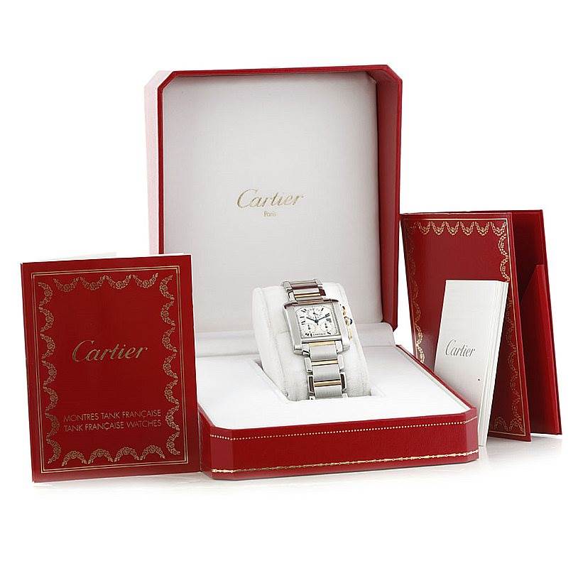 The image shows a Cartier Tank Francaise W51004Q4 Men's Steel and Gold (two tone) Silver Dial W51004Q4 Men's Steel and Gold (two tone) Silver Dial watch inside its open red box, accompanied by booklets.