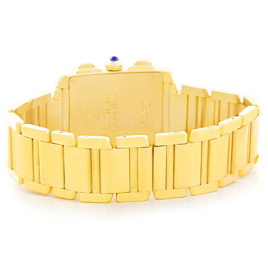 The image shows the back and bracelet of a Cartier Tank Francaise W50005R2 Men
s Yellow Gold Silver Dial W50005R2 Men
s Yellow Gold Silver Dial watch at a slight upward angle.