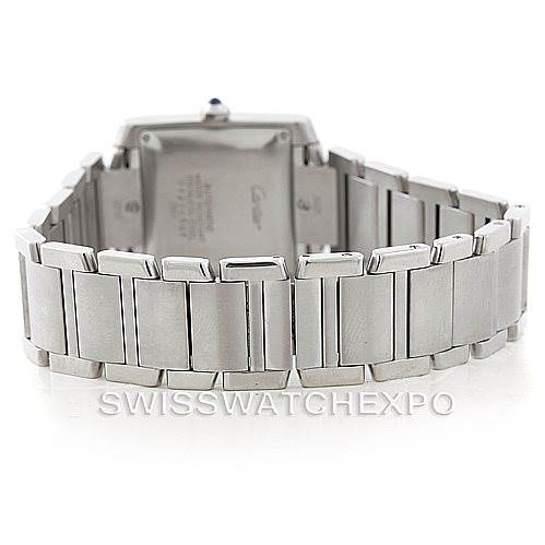The image shows the back view of a Cartier Tank Française watch, highlighting the bracelet and case back.