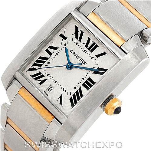 This image shows a close-up of the Cartier Tank Francaise W51005Q4 Men
s Steel and Gold (two tone) Silver Dial W51005Q4 Men
s Steel and Gold (two tone) Silver Dial watch face and part of the bracelet, displaying Roman numerals and the blue-steel hands.