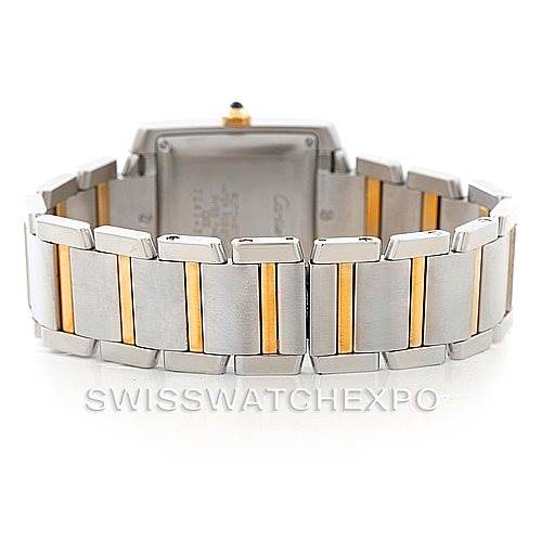 The image shows the back view of a Cartier Tank Francaise W51005Q4 Men
s Steel and Gold (two tone) Silver Dial W51005Q4 Men
s Steel and Gold (two tone) Silver Dial watch, focusing on its bracelet with a two-tone design.