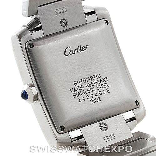 The image shows the back case of a Cartier Tank Française watch, highlighting the inscriptions, crown, and links of the bracelet.