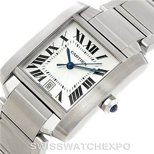 The image shows a close-up view of the Cartier Tank Française watch, highlighting the square face, Roman numeral dial, and stainless steel bracelet.
