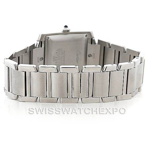 The image shows the back view of a Cartier Tank Francaise W51002Q3 Men
s Stainless Steel Silver Dial W51002Q3 Men
s Stainless Steel Silver Dial watch, focusing on its stainless steel bracelet and caseback.