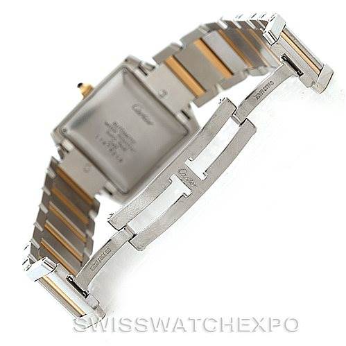 The image displays the back and side view of a Cartier Tank Française watch, highlighting its stainless steel and gold bracelet.