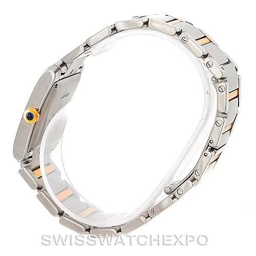 The Cartier Tank Francaise W51005Q4 Men's Steel and Gold (two tone) Silver Dial W51005Q4 Men's Steel and Gold (two tone) Silver Dial watch is shown from the side, highlighting the metal bracelet and crown with a blue cabochon.
