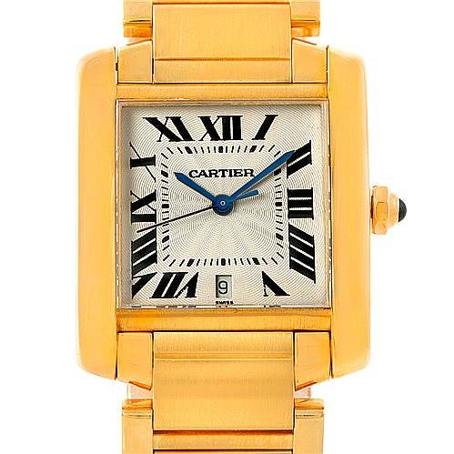 This image shows a frontal view of a Cartier Tank Française watch, highlighting its gold case, dial, and bracelet.