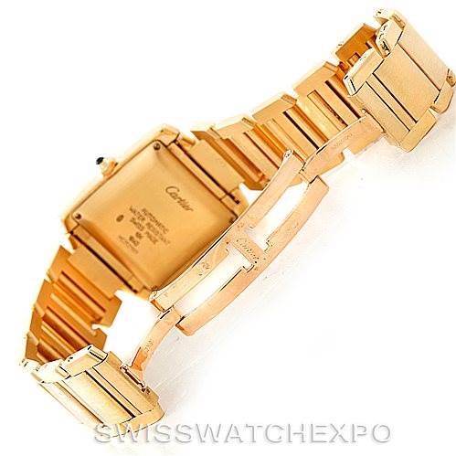 The image shows the Cartier Tank Francaise W50001R2 Men
s Yellow Gold Silver Dial W50001R2 Men
s Yellow Gold Silver Dial watch from a rear angle, highlighting the back case and bracelet.