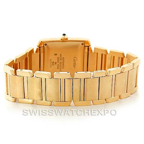 The image shows the back and bracelet of a Cartier Tank Francaise W50001R2 Men
s Yellow Gold Silver Dial W50001R2 Men
s Yellow Gold Silver Dial watch from a rear angle.